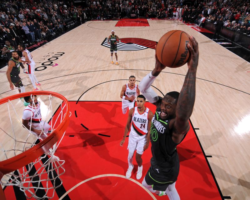 PORTLAND, OR - NOVEMBER 13: Julius Randle #30 of the Minnesota Timberwolves dunks the ball during the game against the Portland Trail Blazers on November 13, 2024 at the Moda Center Arena in Portland, Oregon. NOTE TO USER: User expressly acknowledges and agrees that, by downloading and or using this photograph, user is consenting to the terms and conditions of the Getty Images License Agreement. Mandatory Copyright Notice: Copyright 2024 NBAE (Photo by Cameron Browne/NBAE via Getty Images)