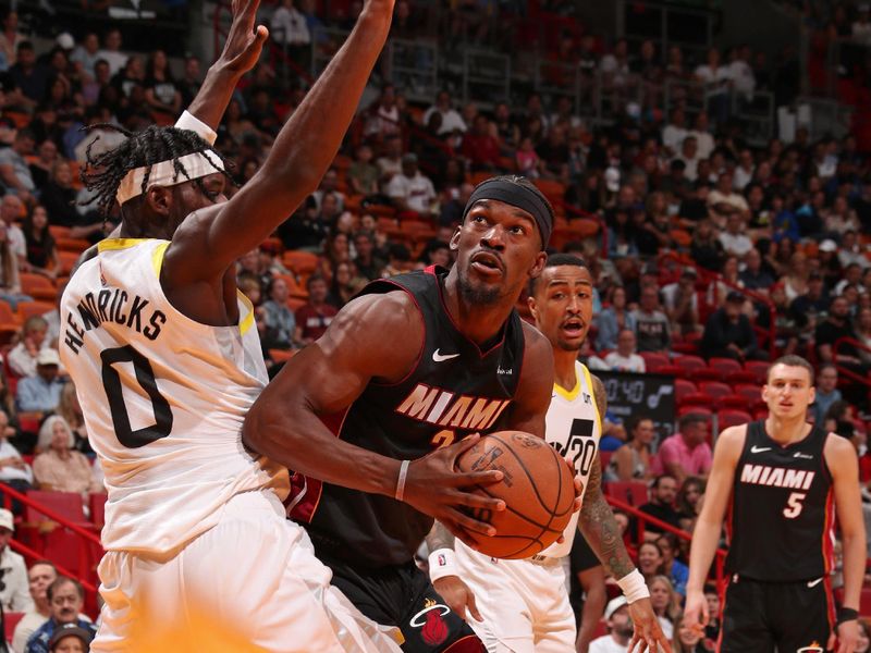 MIAMI, FL - MARCH 2: Jimmy Butler #22 of the Miami Heat drives to the basket during the game against the Utah Jazz on March 2, 2024 at Kaseya Center in Miami, Florida. NOTE TO USER: User expressly acknowledges and agrees that, by downloading and or using this Photograph, user is consenting to the terms and conditions of the Getty Images License Agreement. Mandatory Copyright Notice: Copyright 2024 NBAE (Photo by Issac Baldizon/NBAE via Getty Images)