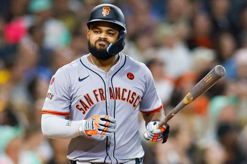 Sep 6, 2024; San Diego, California, USA; San Francisco Giants left fielder Heliot Ramos (17) reacts after flying out to left field during the fifth inning at Petco Park. Mandatory Credit: David Frerker-Imagn Images