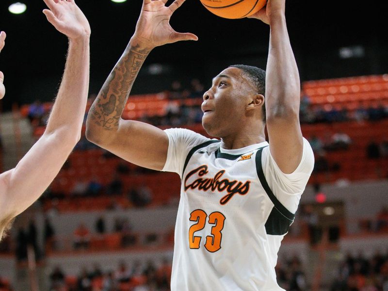 Jan 16, 2024; Stillwater, Oklahoma, USA; Oklahoma State Cowboys center Brandon Garrison (23) puts up a shot during the first half against the Kansas Jayhawks at Gallagher-Iba Arena. Mandatory Credit: William Purnell-USA TODAY Sports