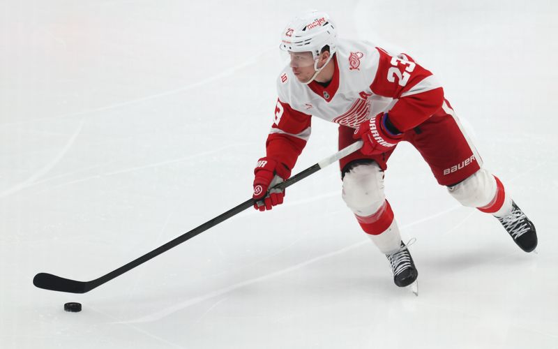 Mar 31, 2026; Pittsburgh, Pennsylvania, USA; Detroit Red Wings left wing Lucas Raymond (23) skates with the puck against the Pittsburgh Penguins during the third period at PPG Paints Arena. Mandatory Credit: Charles LeClaire-Imagn Images Mar 31, 2026; Pittsburgh, Pennsylvania, USA; Detroit Red Wings left wing Lucas Raymond (23) skates with the puck against the Pittsburgh Penguins during the third period at PPG Paints Arena. Mandatory Credit: Charles LeClaire-Imagn Images