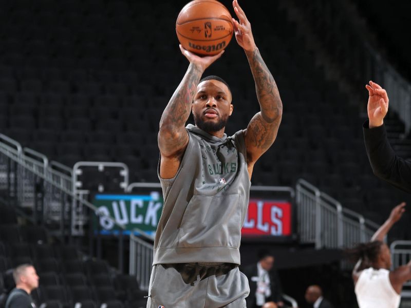 MILWAUKEE, WI - NOVEMBER 20: Damian Lillard #0 of the Milwaukee Bucks warms up before the game against the Chicago Bulls on November 20, 2024 at the Fiserv Forum Center in Milwaukee, Wisconsin. NOTE TO USER: User expressly acknowledges and agrees that, by downloading and or using this Photograph, user is consenting to the terms and conditions of the Getty Images License Agreement. Mandatory Copyright Notice: Copyright 2024 NBAE (Photo by Gary Dineen/NBAE via Getty Images).