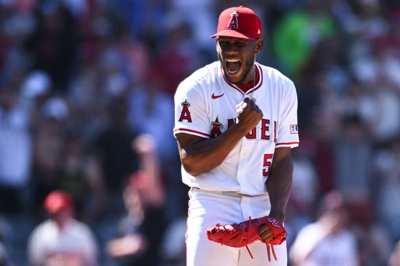 Aug 4, 2024; Anaheim, California, USA; Los Angeles Angels pitcher Roansy Contreras (57) reacts after throwing the final out against the New York Mets during the ninth inning at Angel Stadium. Mandatory Credit: Jonathan Hui-USA TODAY Sports