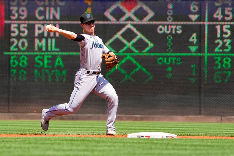 Sep 3, 2023; Washington, District of Columbia, USA;  Miami Marlins shortstop Joey Wendle (18) throws out Washington Nationals second baseman Travis Blankenhorn (not pictured) after fielding a ground ball during the first inning at Nationals Park. Mandatory Credit: Gregory Fisher-USA TODAY Sports