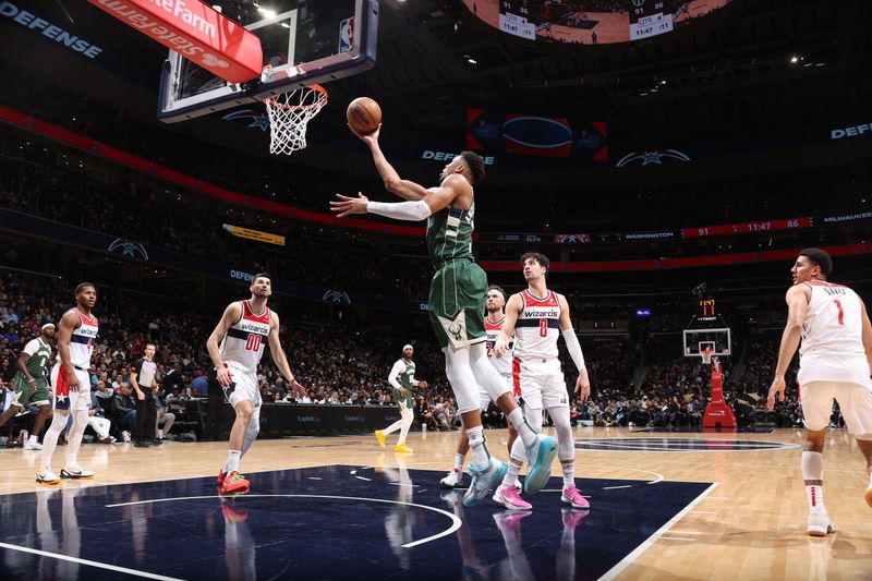 WASHINGTON, DC -? APRIL 2: Giannis Antetokounmpo #34 of the Milwaukee Bucks shoots the ball during the game against the Washington Wizards on April 2, 2024 at Capital One Arena in Washington, DC. NOTE TO USER: User expressly acknowledges and agrees that, by downloading and or using this Photograph, user is consenting to the terms and conditions of the Getty Images License Agreement. Mandatory Copyright Notice: Copyright 2024 NBAE (Photo by Stephen Gosling/NBAE via Getty Images)