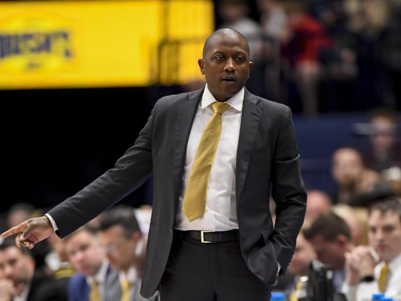 Mar 13, 2024; Nashville, TN, USA;  Missouri Tigers head coach Dennis Gates reacts during the first half at Bridgestone Arena. Mandatory Credit: Steve Roberts-USA TODAY Sports