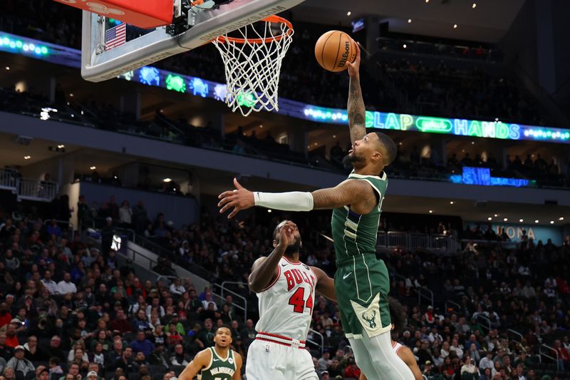 MILWAUKEE, WISCONSIN - DECEMBER 11: Damian Lillard #0 of the Milwaukee Bucks drives to the basket against Patrick Williams #44 of the Chicago Bulls \dag at Fiserv Forum on December 11, 2023 in Milwaukee, Wisconsin. NOTE TO USER: User expressly acknowledges and agrees that, by downloading and or using this photograph, User is consenting to the terms and conditions of the Getty Images License Agreement. (Photo by Stacy Revere/Getty Images)