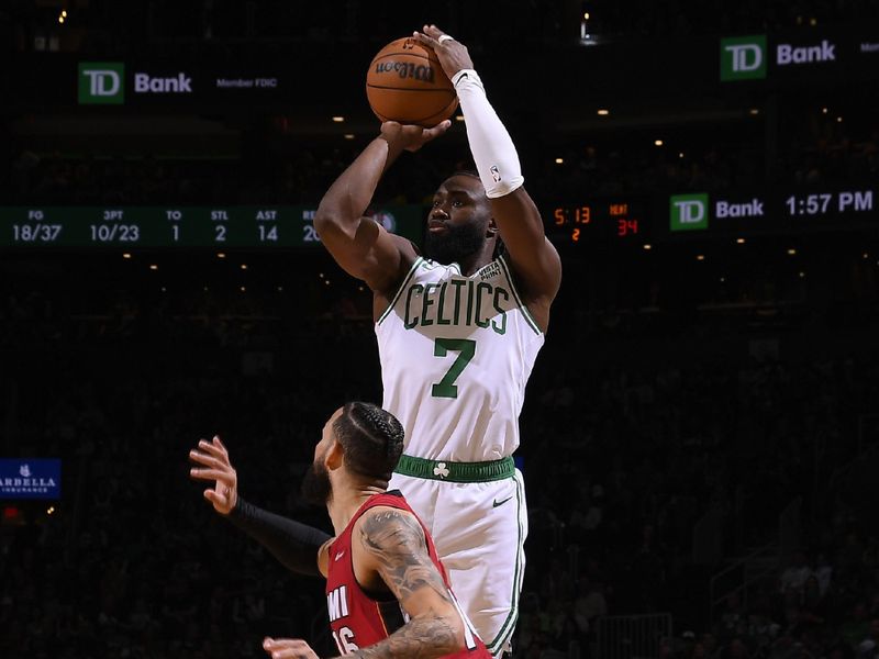 BOSTON, MA - APRIL 21: Jaylen Brown #7 of the Boston Celtics shoots a three point basket against the Miami Heat during Round 1 Game 1 of the 2024 NBA Playoffs on April 21, 2024 at the TD Garden in Boston, Massachusetts. NOTE TO USER: User expressly acknowledges and agrees that, by downloading and or using this photograph, User is consenting to the terms and conditions of the Getty Images License Agreement. Mandatory Copyright Notice: Copyright 2024 NBAE  (Photo by Brian Babineau/NBAE via Getty Images)