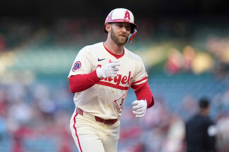 May 8, 2025; Anaheim, California, USA; Los Angeles Angels left fielder Taylor Ward (3) gestures after hitting a two-run home run in the first inning against the Toronto Blue Jays at Angel Stadium. Mandatory Credit: Kirby Lee-Imagn Images