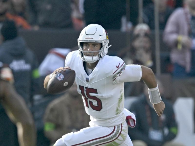 Arizona Cardinals quarterback Clayton Tune (15) runs with the ball during an NFL football game against the Cleveland Browns, Sunday, Nov. 5, 2023, in Cleveland. The Browns won 27-0. (AP Photo/David Richard)