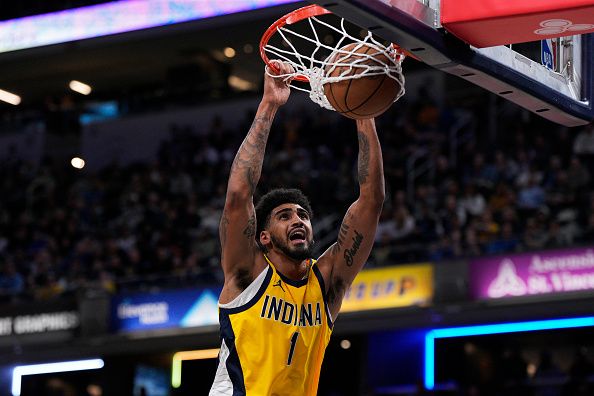 INDIANAPOLIS, INDIANA - NOVEMBER 19: Obi Toppin #1 of the Indiana Pacers dunks during the second half of an NBA basketball game against the Orlando Magic at Gainbridge Fieldhouse on November 19, 2023 in Indianapolis, Indiana. NOTE TO USER: User expressly acknowledges and agrees that, by downloading and or using this photograph, User is consenting to the terms and conditions of the Getty Images License Agreement. (Photo by Jeff Dean/Getty Images)