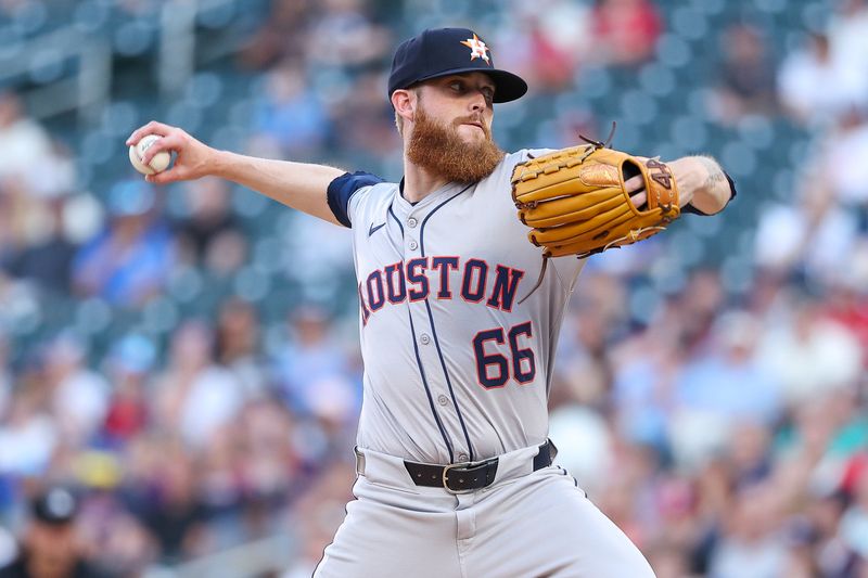 Jul 5, 2024; Minneapolis, Minnesota, USA; Houston Astros starting pitcher Shawn Dubin (66) pitches against the Minnesota Twins during the first inning at Target Field. Mandatory Credit: Matt Krohn-USA TODAY Sports