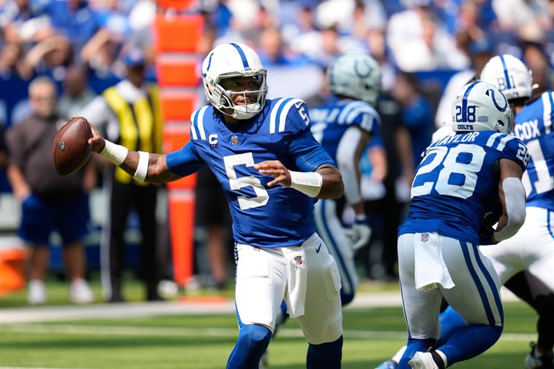 Indianapolis Colts quarterback Anthony Richardson (5) throws during the first half of an NFL football game against the Houston Texans, Sunday, Sept. 8, 2024, in Indianapolis. (AP Photo/Michael Conroy)