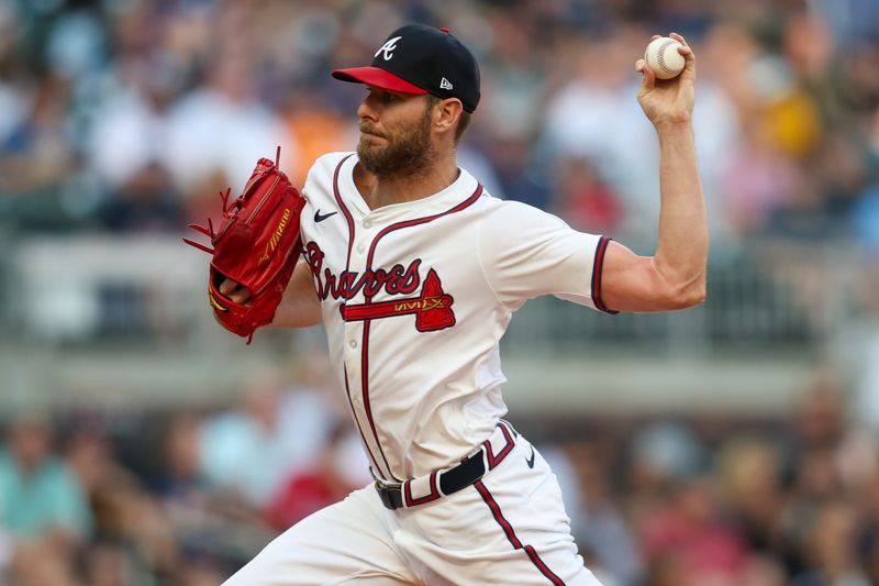 Aug 7, 2024; Atlanta, Georgia, USA; Atlanta Braves starting pitcher Chris Sale (51) throws against the Milwaukee Brewers in the first inning at Truist Park. Mandatory Credit: Brett Davis-USA TODAY Sports
