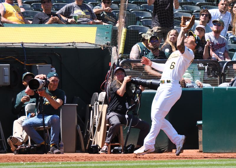 Jun 15, 2023; Oakland, California, USA; Oakland Athletics third baseman Jace Peterson (6) catches a foul ball against the Tampa Bay Rays during the seventh inning at Oakland-Alameda County Coliseum. Mandatory Credit: Kelley L Cox-USA TODAY Sports