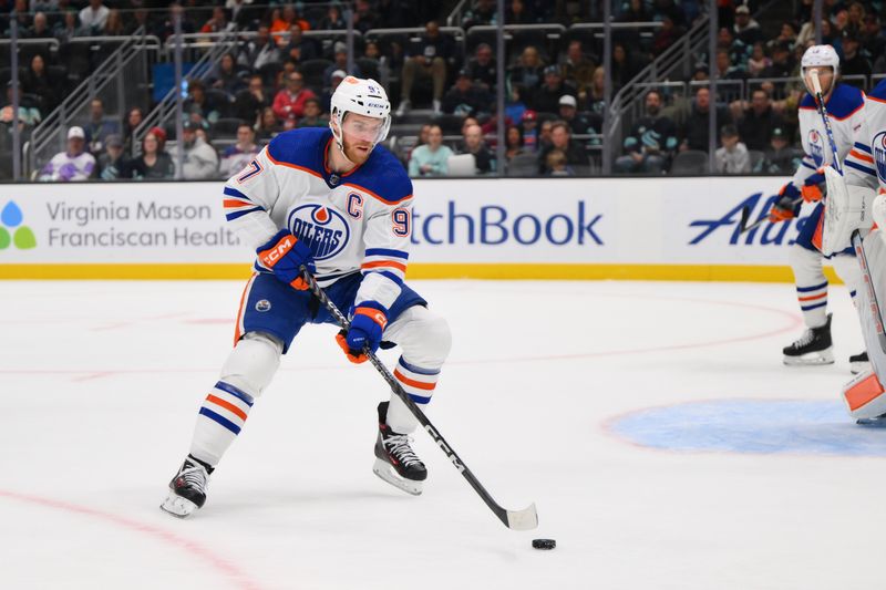 Mar 2, 2024; Seattle, Washington, USA; Edmonton Oilers center Connor McDavid (97) plays the puck during the second period against the Seattle Kraken at Climate Pledge Arena. Mandatory Credit: Steven Bisig-USA TODAY Sports