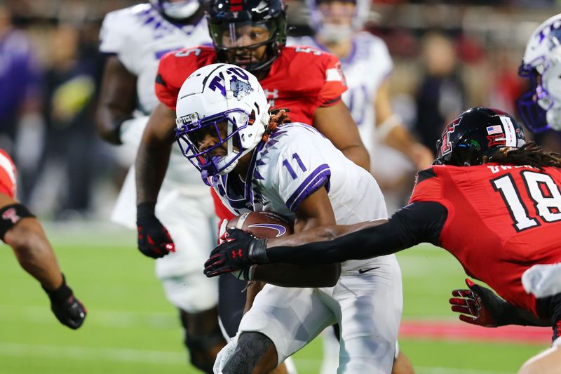 Nov 2, 2023; Lubbock, Texas, USA; Texas Christian Horned Frogs wide receiver JoJo Earl (11) rushes against Texas Tech Red Raiders defensive safety Tyler Owens (18) in the first half at Jones AT&T Stadium and Cody Campbell Field. Mandatory Credit: Michael C. Johnson-USA TODAY Sports