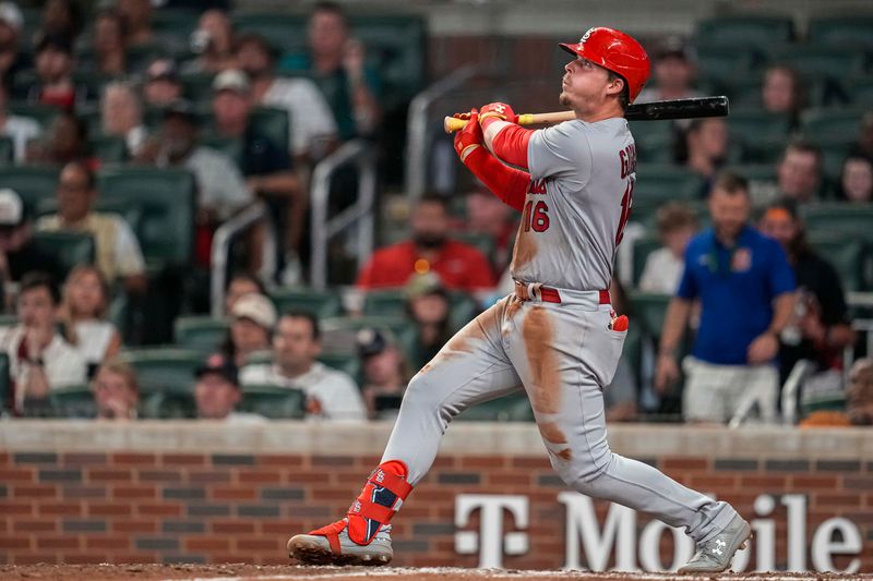 Sep 6, 2023; Cumberland, Georgia, USA; St. Louis Cardinals second baseman Nolan Gorman (16) hits a three run home run against the Atlanta Braves during the eighth inning at Truist Park. Mandatory Credit: Dale Zanine-USA TODAY Sports