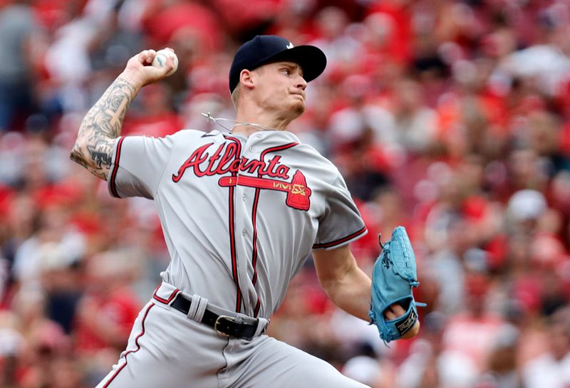 Jun 23, 2023; Cincinnati, Ohio, USA; Atlanta Braves starting pitcher AJ Smith-Shawver (62) delivers a pitch against the Cincinnati Reds during the first inning at Great American Ball Park. Mandatory Credit: David Kohl-USA TODAY Sports