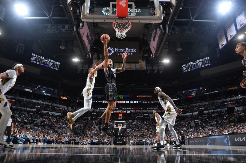 SAN ANTONIO, TX - MARCH 3: Jeremy Sochan #10 of the San Antonio Spurs drives to the basket during the game against the Indiana Pacers on March 3, 2024 at the Frost Bank Center in San Antonio, Texas. NOTE TO USER: User expressly acknowledges and agrees that, by downloading and or using this photograph, user is consenting to the terms and conditions of the Getty Images License Agreement. Mandatory Copyright Notice: Copyright 2024 NBAE (Photos by Michael Gonzales/NBAE via Getty Images)