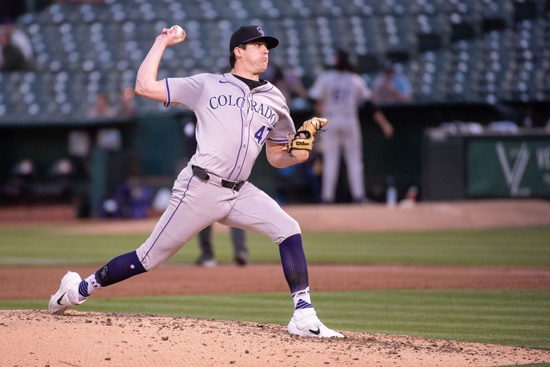 May 21, 2024; Oakland, California, USA; Colorado Rockies pitcher Cal Quantrill (47) throws a pitch during the sixth inning against the Oakland Athletics at Oakland-Alameda County Coliseum. Mandatory Credit: Ed Szczepanski-USA TODAY Sports