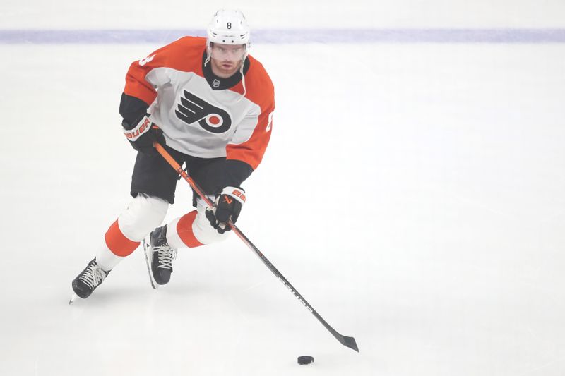 Feb 27, 2025; Pittsburgh, Pennsylvania, USA;  Philadelphia Flyers defenseman Cam York (8) warms up against the Pittsburgh Penguins at PPG Paints Arena. Mandatory Credit: Charles LeClaire-Imagn Images