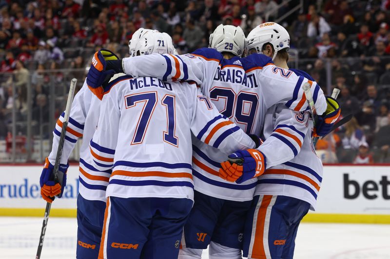 Dec 21, 2023; Newark, New Jersey, USA; Edmonton Oilers center Leon Draisaitl (29) celebrates his goal against the New Jersey Devils during the third period at Prudential Center. Mandatory Credit: Ed Mulholland-USA TODAY Sports