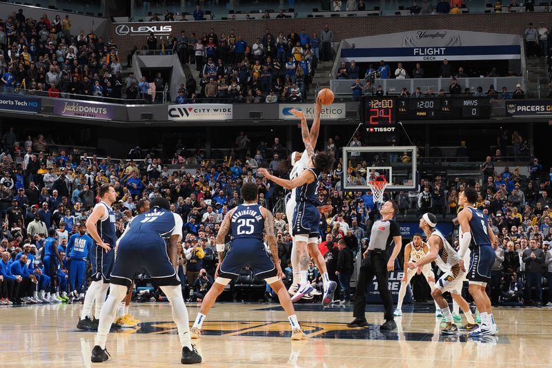 INDIANAPOLIS, IN - FEBRUARY 25: Myles Turner #33 of the Indiana Pacers goes for the opening tip during the game against the Dallas Mavericks on February 25, 2024 at Gainbridge Fieldhouse in Indianapolis, Indiana. NOTE TO USER: User expressly acknowledges and agrees that, by downloading and or using this Photograph, user is consenting to the terms and conditions of the Getty Images License Agreement. Mandatory Copyright Notice: Copyright 2024 NBAE (Photo by Ron Hoskins/NBAE via Getty Images)