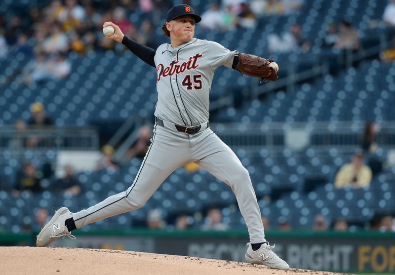 Apr 8, 2024; Pittsburgh, Pennsylvania, USA;  Detroit Tigers  starting pitcher Reese Olson (45) delivers a pitch against the Pittsburgh Pirates during the first inning at PNC Park. Mandatory Credit: Charles LeClaire-USA TODAY Sports