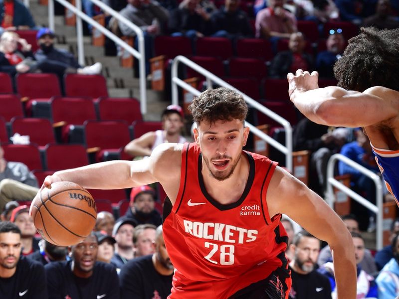 HOUSTON, TX - FEBRUARY 1: Alperen Sengun #28 of the Houston Rockets dribbles the ball during the game against the New York Knicks on February 1, 2024 at the Toyota Center in Houston, Texas. NOTE TO USER: User expressly acknowledges and agrees that, by downloading and or using this photograph, User is consenting to the terms and conditions of the Getty Images License Agreement. Mandatory Copyright Notice: Copyright 2024 NBAE (Photo by Logan Riely/NBAE via Getty Images)