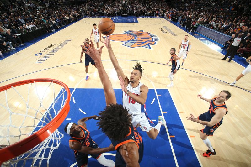 NEW YORK, NY - FEBRUARY 26:Tosan Evbuomwan #18 of the Detroit Pistons drives to the basket during the game against the New York Knicks  on February 26, 2024 at Madison Square Garden in New York City, New York.  NOTE TO USER: User expressly acknowledges and agrees that, by downloading and or using this photograph, User is consenting to the terms and conditions of the Getty Images License Agreement. Mandatory Copyright Notice: Copyright 2024 NBAE  (Photo by Nathaniel S. Butler/NBAE via Getty Images)