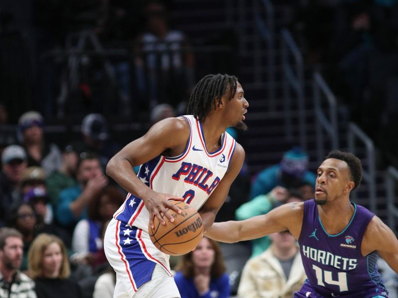 CHARLOTTE, NC - JANUARY 20:  Tyrese Maxey #0 of the Philadelphia 76ers handles the ball during the game  on January 20, 2024 at Spectrum Center in Charlotte, North Carolina. NOTE TO USER: User expressly acknowledges and agrees that, by downloading and or using this photograph, User is consenting to the terms and conditions of the Getty Images License Agreement.  Mandatory Copyright Notice:  Copyright 2024 NBAE (Photo by Brock Williams-Smith/NBAE via Getty Images)