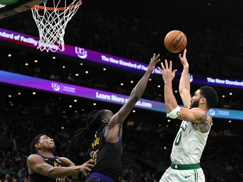 BOSTON, MASSACHUSETTS - FEBRUARY 01: Jayson Tatum #0 of the Boston Celtics attempts a basket against Taurean Prince #12 of the Los Angeles Lakers during the fourth quarter at the TD Garden on February 01, 2024 in Boston, Massachusetts. NOTE TO USER: User expressly acknowledges and agrees that, by downloading and or using this photograph, User is consenting to the terms and conditions of the Getty Images License Agreement. (Photo by Brian Fluharty/Getty Images)