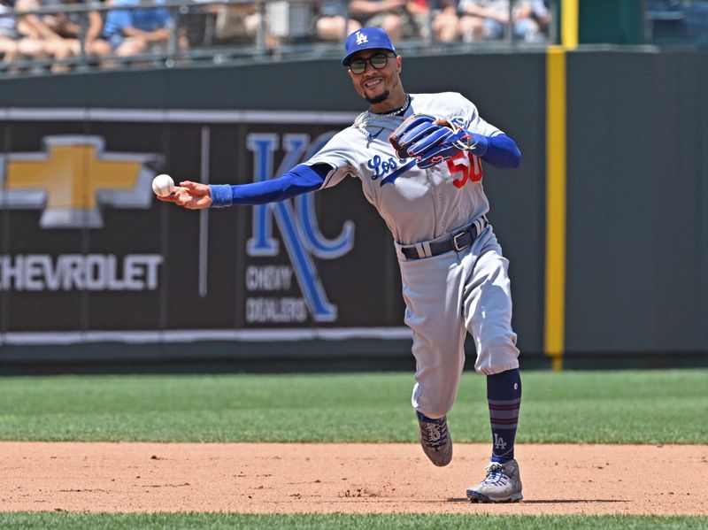 Jul 2, 2023; Kansas City, Missouri, USA;  Los Angeles Dodgers shortstop Mookie Betts (50) throws to first base for an out in the fourth inning against the Kansas City Royals at Kauffman Stadium. Mandatory Credit: Peter Aiken-USA TODAY Sports