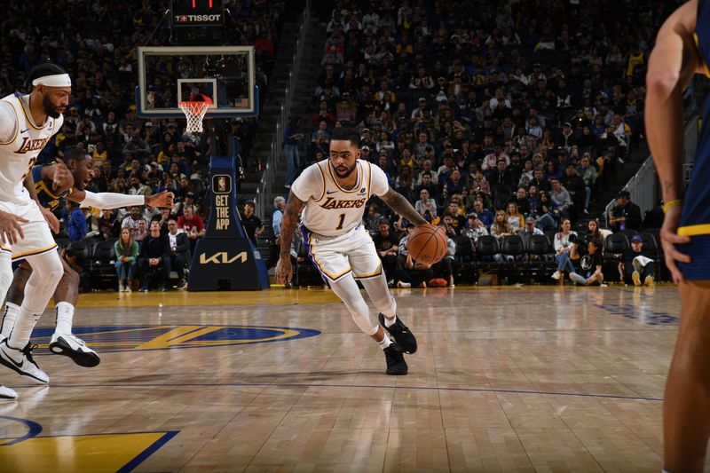 SAN FRANCISCO, CA - JANUARY 27: D'Angelo Russell #1 of the Los Angeles Lakers dribbles the ball during the game against the Golden State Warriors on January 27, 2024 at Chase Center in San Francisco, California. NOTE TO USER: User expressly acknowledges and agrees that, by downloading and or using this photograph, user is consenting to the terms and conditions of Getty Images License Agreement. Mandatory Copyright Notice: Copyright 2024 NBAE (Photo by Noah Graham/NBAE via Getty Images)