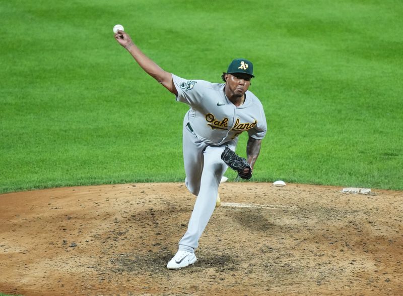 Jul 29, 2023; Denver, Colorado, USA; Oakland Athletics relief pitcher Angel Felipe (53) delivers against the Colorado Rockies in the ninth inning at Coors Field. Mandatory Credit: Ron Chenoy-USA TODAY Sports