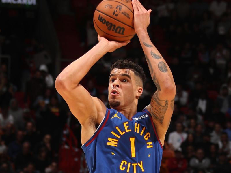 MIAMI, FL - JANUARY 17: Michael Porter Jr. #1 of the Denver Nuggets shoots the ball during the game during the game against the Miami Heat on January 17, 2025 at Kaseya Center in Miami, Florida. NOTE TO USER: User expressly acknowledges and agrees that, by downloading and or using this Photograph, user is consenting to the terms and conditions of the Getty Images License Agreement. Mandatory Copyright Notice: Copyright 2025 NBAE (Photo by Issac Baldizon/NBAE via Getty Images)