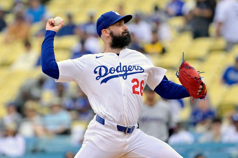 Apr 30, 2025; Los Angeles, California, USA; Los Angeles Dodgers starting pitcher Tony Gonsolin (26) pitches against the Miami Marlins during the first inning at Dodger Stadium. Mandatory Credit: Jayne Kamin-Oncea-Imagn Images