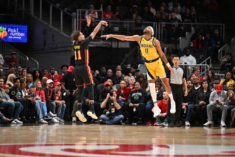 ATLANTA, GEORGIA - JANUARY 12: Trae Young #11 of the Atlanta Hawks shoots the ball during the game against the Indiana Pacers on January 12, 2024 at State Farm Arena in Atlanta, Georgia.  NOTE TO USER: User expressly acknowledges and agrees that, by downloading and or using this photograph, User is consenting to the terms and conditions of the Getty Images License Agreement. (Photo by Paras Griffin/Getty Images)