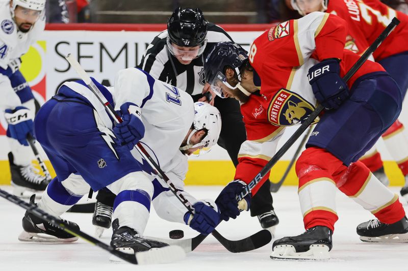 Apr 23, 2024; Sunrise, Florida, USA; Tampa Bay Lightning center Anthony Cirelli (71) and Florida Panthers center Kevin Stenlund (82) face-off during the second period in game two of the first round of the 2024 Stanley Cup Playoffs at Amerant Bank Arena. Mandatory Credit: Sam Navarro-USA TODAY Sports