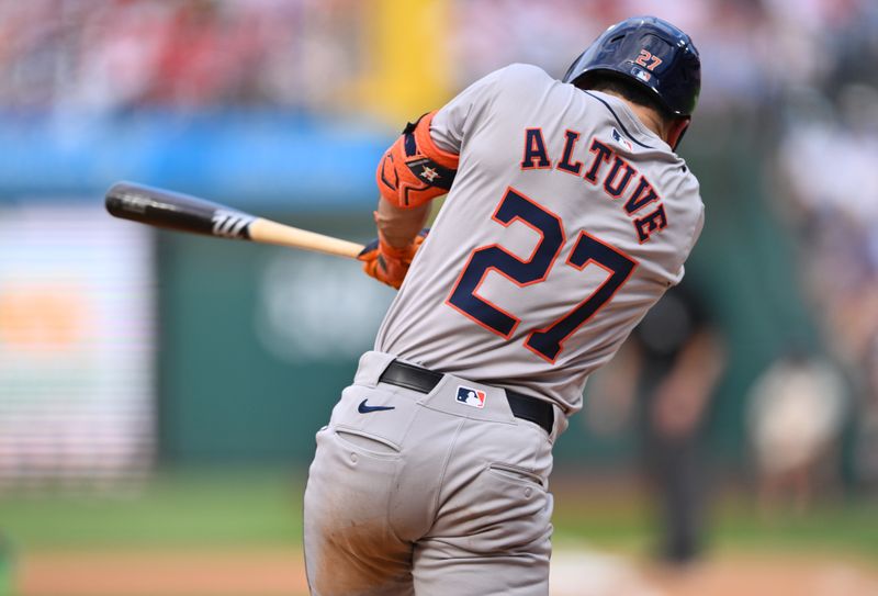 Aug 28, 2024; Philadelphia, Pennsylvania, USA; Houston Astros infielder Jose Altuve (27) hits into a fielder's choice to advance to first against the Philadelphia Phillies in the fourth inning at Citizens Bank Park. Mandatory Credit: Kyle Ross-USA TODAY Sports