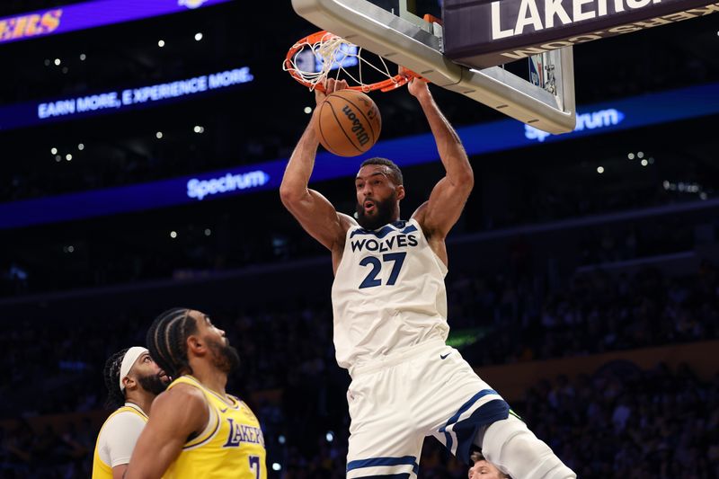 LOS ANGELES, CALIFORNIA - OCTOBER 22: Rudy Gobert #27 of the Minnesota Timberwolves dunks the ball during the third quarter against the Los Angeles Lakers at Crypto.com Arena on October 22, 2024 in Los Angeles, California. (Photo by Harry How/Getty Images)