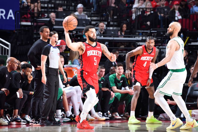 HOUSTON, TX - JANUARY 3:  Fred VanVleet #5 of the Houston Rockets passes the ball during the game against the Boston Celtics on January 3, 2025 at the Toyota Center in Houston, Texas. NOTE TO USER: User expressly acknowledges and agrees that, by downloading and or using this photograph, User is consenting to the terms and conditions of the Getty Images License Agreement. Mandatory Copyright Notice: Copyright 2025 NBAE (Photo by Logan Riely/NBAE via Getty Images)