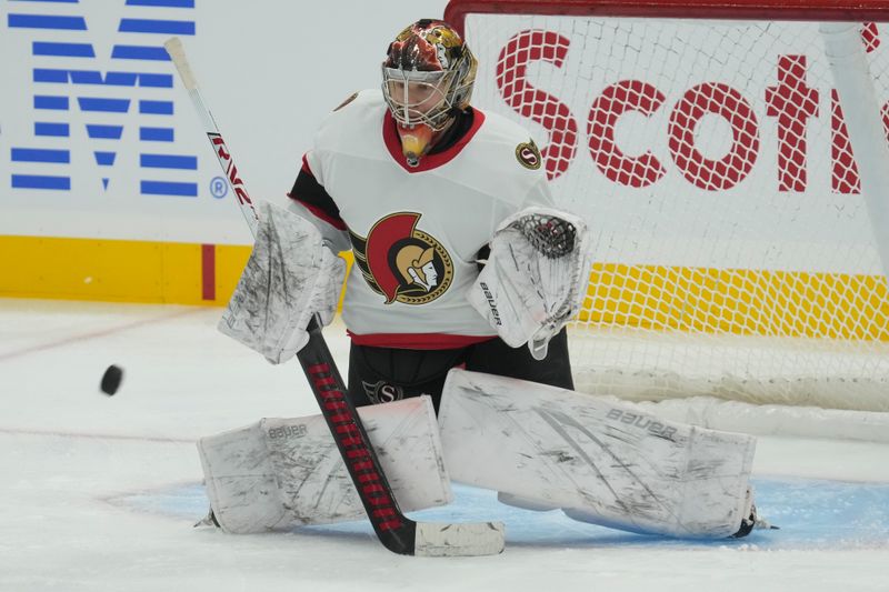 Sep 25, 2023; Toronto, Ontario, CAN; Ottawa Senators goaltender Leevi Merilainen (35) goes to make a save during warm up before a game against the Toronto Maple Leafs at Scotiabank Arena. Mandatory Credit: John E. Sokolowski-USA TODAY Sports