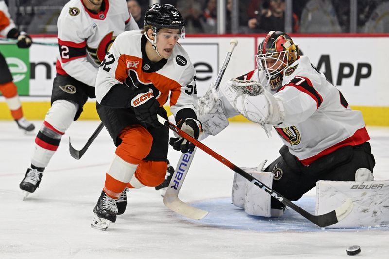 Feb 5, 2026; Philadelphia, Pennsylvania, USA; Philadelphia Flyers center Denver Barkey (52) reaches for the puck against Ottawa Senators goaltender James Reimer (47) during the first period at Xfinity Mobile Arena. Mandatory Credit: Eric Hartline-Imagn Images
