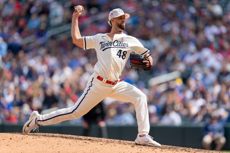 May 14, 2023; Minneapolis, Minnesota, USA; Minnesota Twins relief pitcher Jorge Lopez (48) pitches in relief in the eighth inning against the Chicago Cubs at Target Field. Mandatory Credit: Matt Blewett-USA TODAY Sports