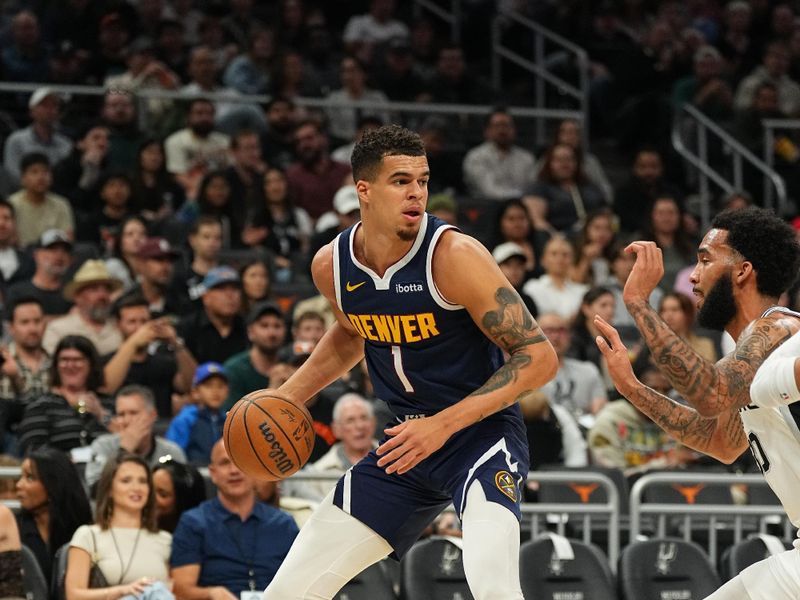 AUSTIN, TX - MARCH 15: Michael Porter Jr. #1 of the Denver Nuggets dribbles the ball during the game against the San Antonio Spurs on March 15, 2024 at the Moody Center in Austin, Texas. NOTE TO USER: User expressly acknowledges and agrees that, by downloading and/or using this Photograph, user is consenting to the terms and conditions of the Getty Images License Agreement. Mandatory Copyright Notice: Copyright 2024 NBAE (Photo by Garrett Ellwood/NBAE via Getty Images)