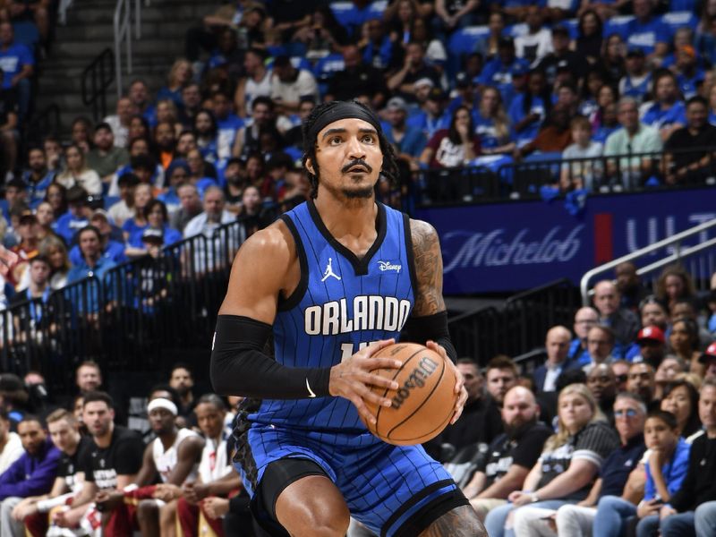 ORLANDO, FL - APRIL 27:Gary Harris #14 of the Orlando Magic handles the ball during the game against the Cleveland Cavaliers during Round 1 Game 4 of the 2024 NBA Playoffs on April 27, 2024 at the Kia Center in Orlando, Florida. NOTE TO USER: User expressly acknowledges and agrees that, by downloading and or using this photograph, User is consenting to the terms and conditions of the Getty Images License Agreement. Mandatory Copyright Notice: Copyright 2024 NBAE (Photo by Fernando Medina/NBAE via Getty Images)