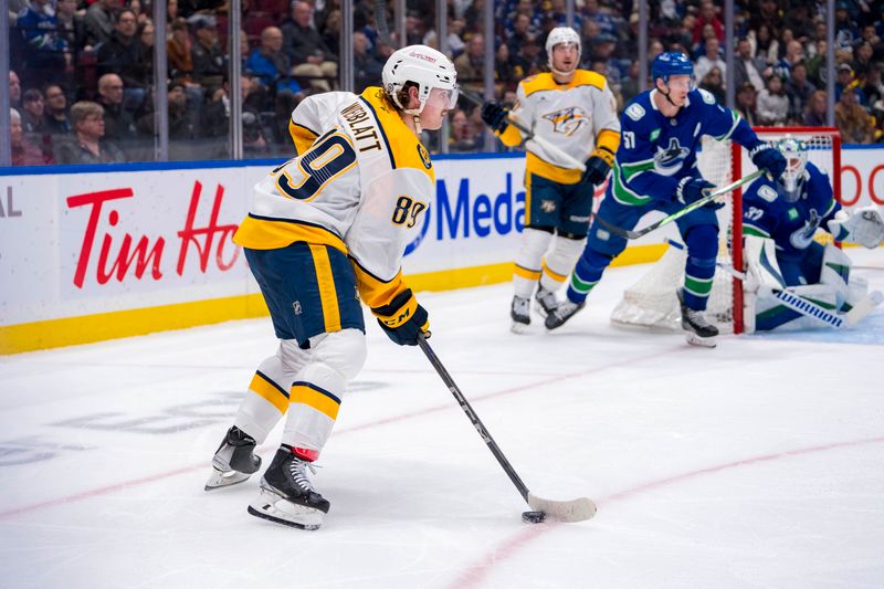 Jan 3, 2025; Vancouver, British Columbia, CAN; Nashville Predators forward Ozzy Wiesblatt (89) handles the puck against the Vancouver Canucks in the first period at Rogers Arena. Mandatory Credit: Bob Frid-Imagn Images