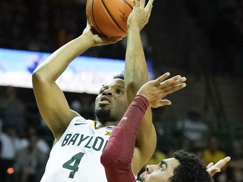 Mar 4, 2023; Waco, Texas, USA; Baylor Bears guard LJ Cryer (4) shoots the ball against Iowa State Cyclones guard Tamin Lipsey (3) during the second half at Ferrell Center. Mandatory Credit: Raymond Carlin III-USA TODAY Sports